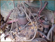 The previous owner said that there were several upset rodents protesting after the Willys was towed from his yard.  I found acorns everywhere in the Willys, including one in the intake manifold.